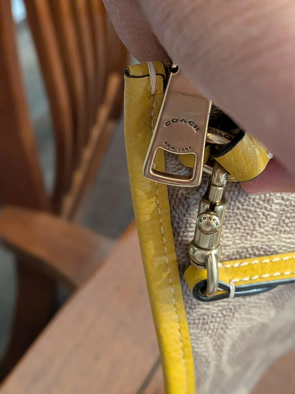 COACH Signature Canvas Wristlet with Yellow Trim
